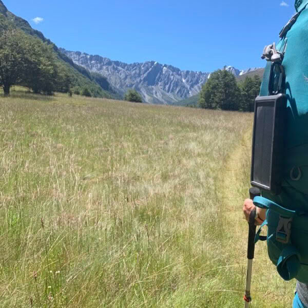 SunSaver 10K power bank on backpack in South Island