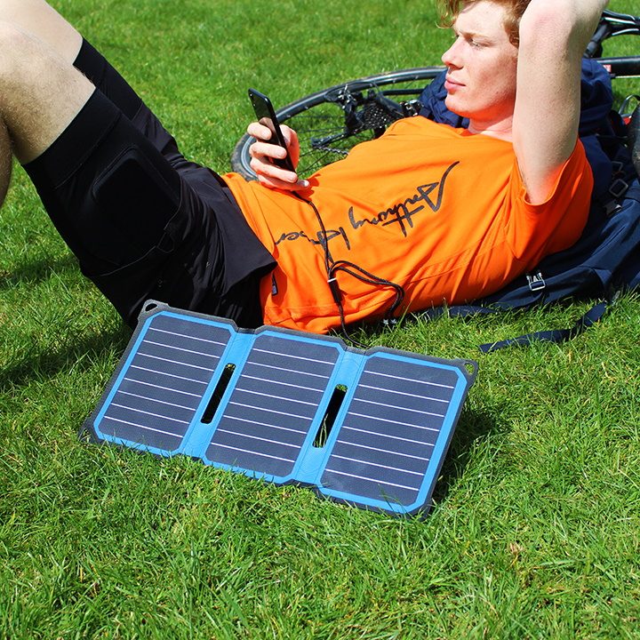 SunSaver Super-Flex charging a phone in the sun